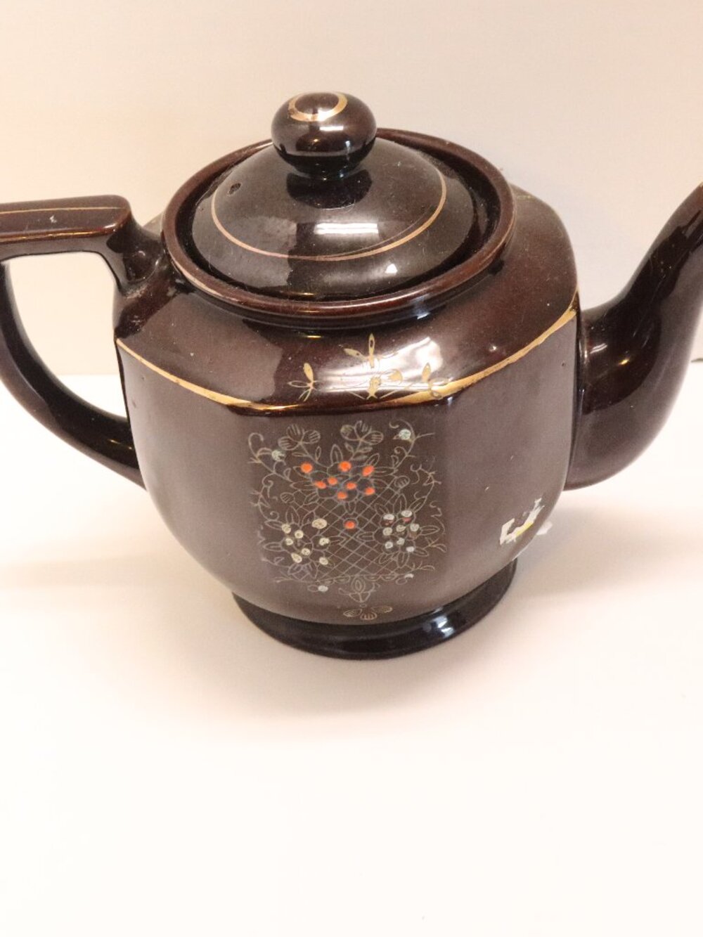 A Porcelain Pitcher made in Japan with Japan Written on Bottom Black